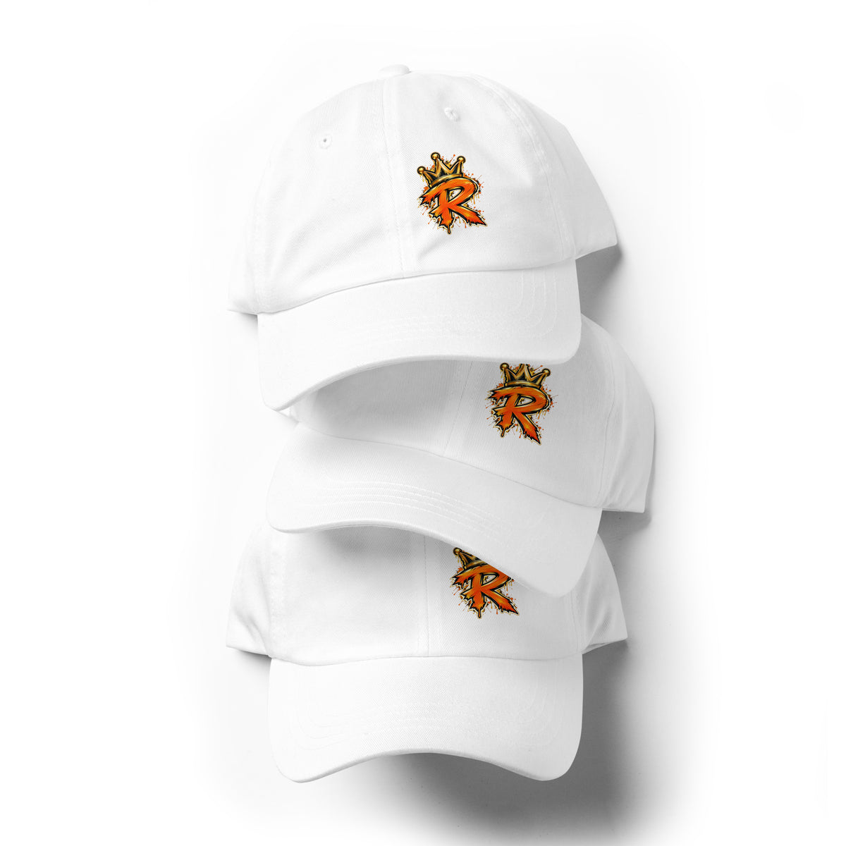 Three stacked white dad hats shown from the front with orange-and-gold crowned R logos