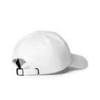 Rear-right view of a white dad hat showing the adjustable strap and metal buckle