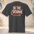 Back mockup of a faded black oversized tee with a crown and cream and orange "BE THE ORIGINAL." lettering