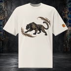Front mockup of a faded bone oversized tee with a black panther, gold-toned ornament and curling paisley flourishes
