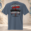 Back mockup of a faded indigo oversized tee with a dark crowd, one red figure and "Stay true to what makes you rare." lettering