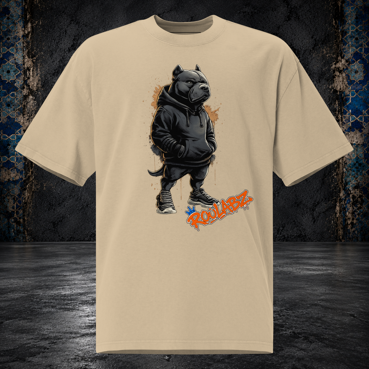 Front mockup of a faded khaki oversized tee with a pitbull character wearing a dark hoodie and headphones