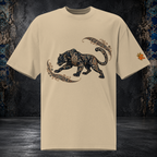 Front mockup of a faded khaki oversized tee with a black panther, gold-toned ornament and curling paisley flourishes