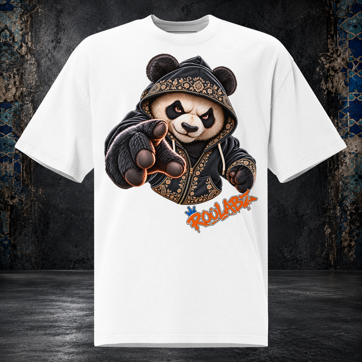Front mockup of a faded white oversized tee with a panda in a patterned hood reaching one gloved paw forward