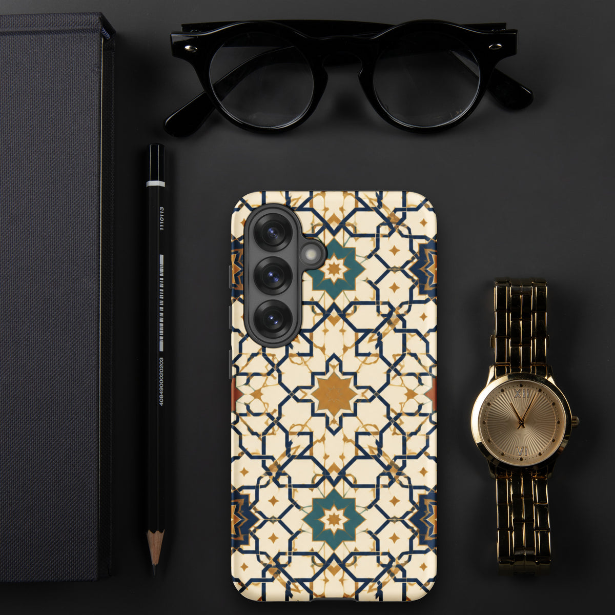 Persian Art case mockup for Samsung Galaxy S25 on a dark desk, showing cream, gold and navy geometric tilework