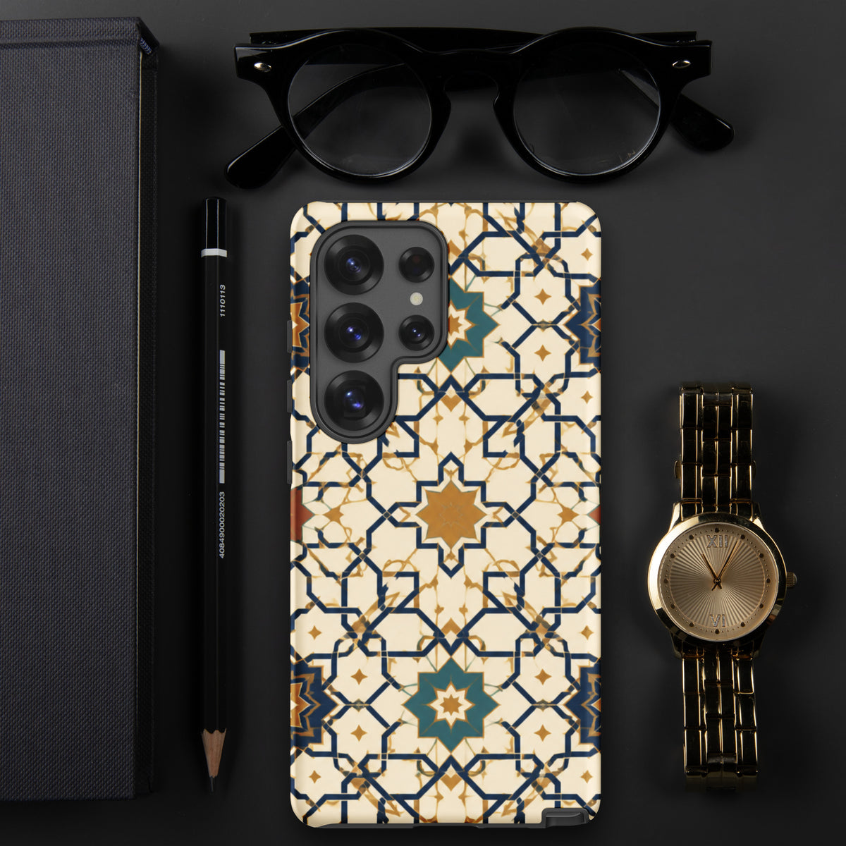 Persian Art case mockup for Samsung Galaxy S25 Ultra on a dark desk, showing cream, gold and navy geometric tilework