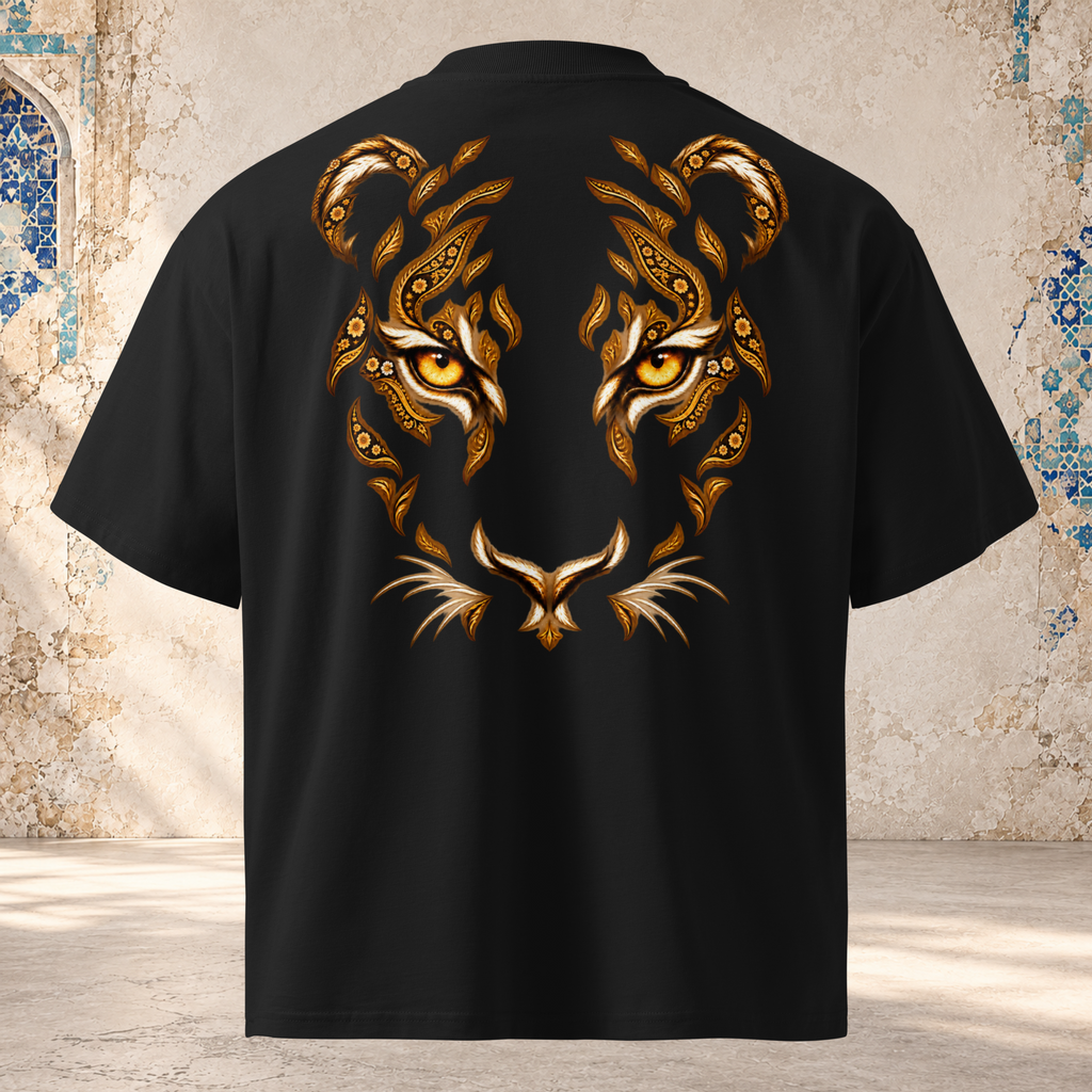 Back mockup of a black oversized tee with a tiger face formed from gold-toned paisley curls