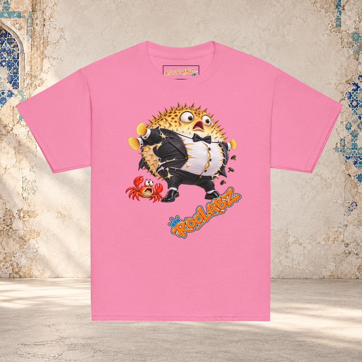 Front mockup of an azalea youth tee with a puffed-up pufferfish bursting out of a black and white tuxedo