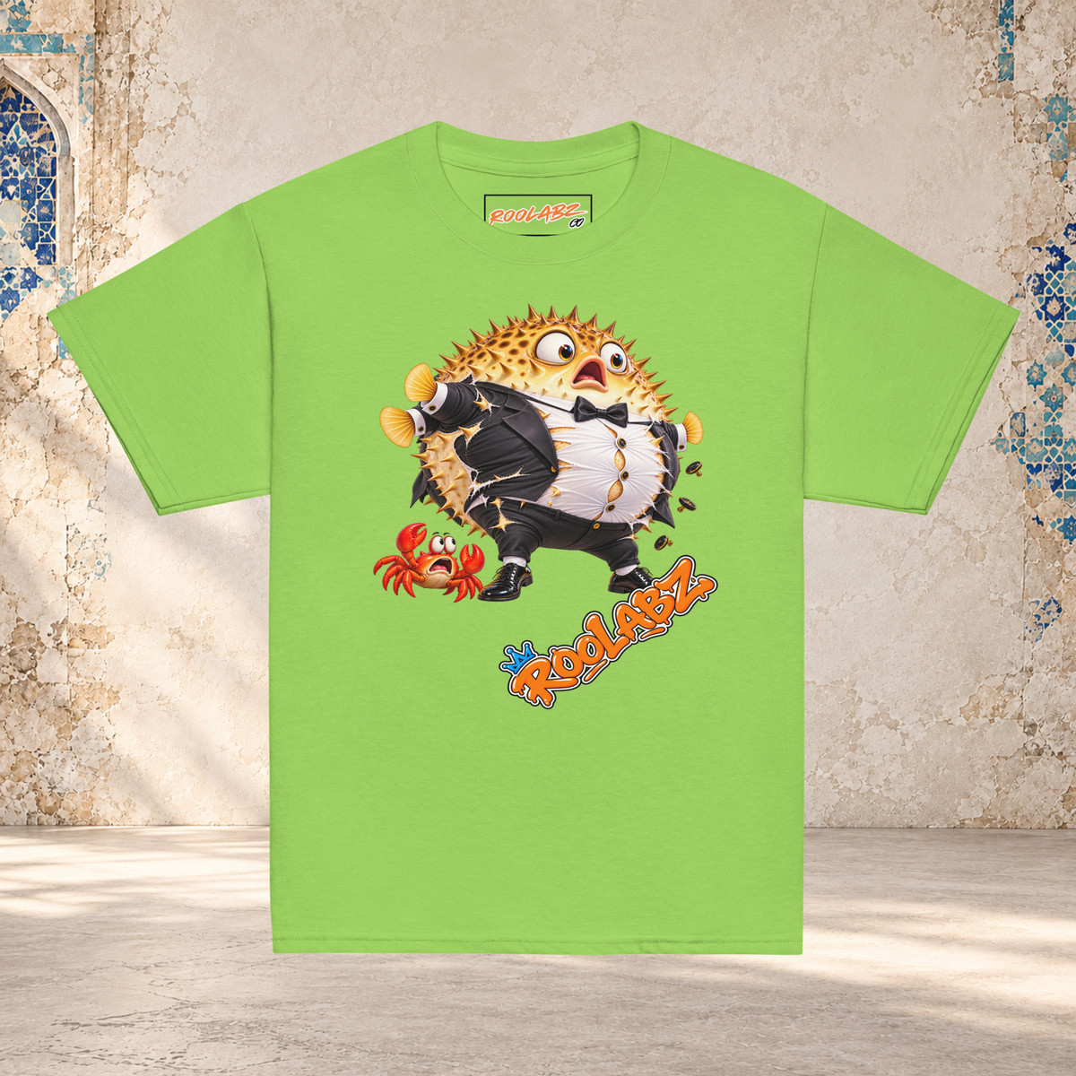 Front mockup of a lime youth tee with a puffed-up pufferfish bursting out of a black and white tuxedo