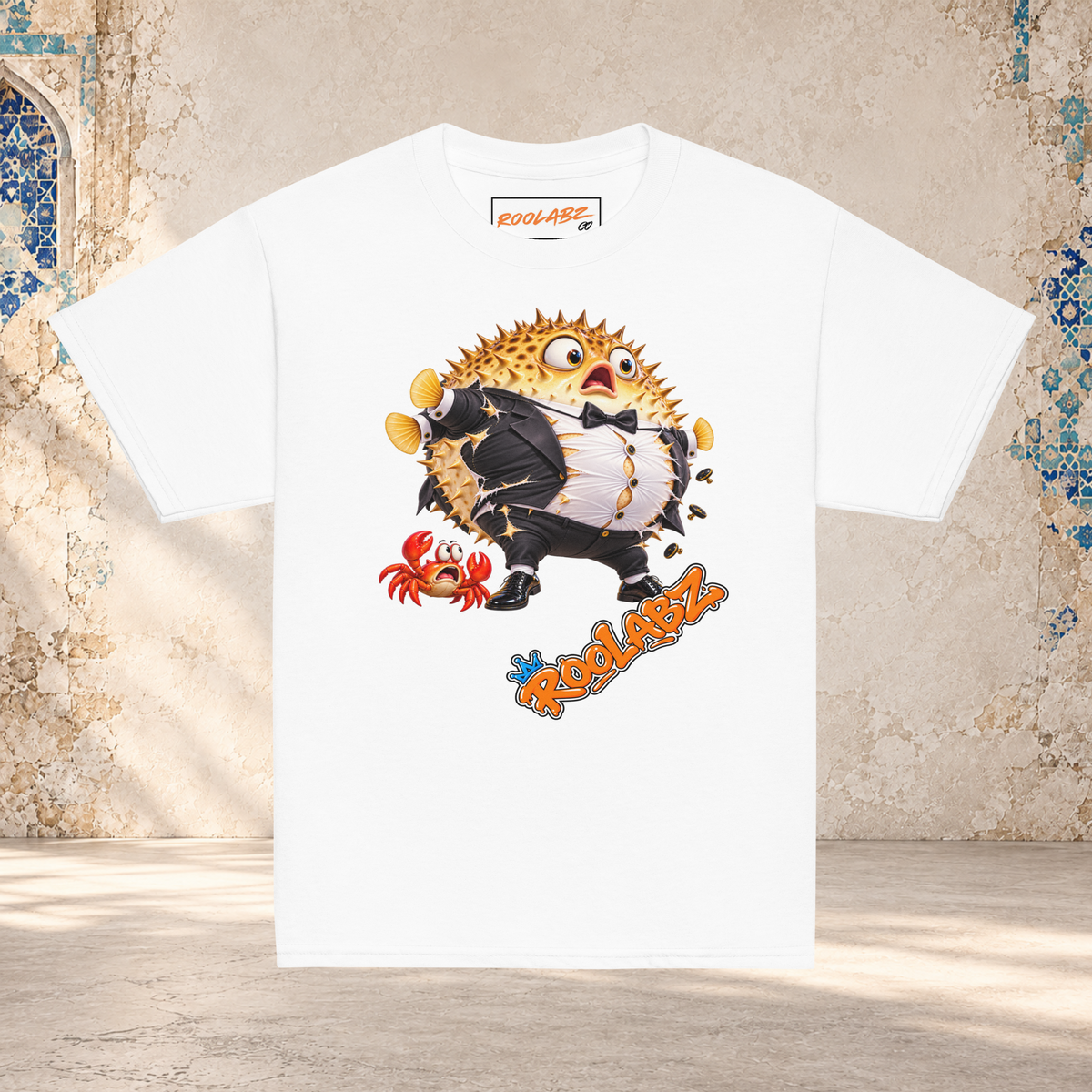 Front mockup of a white youth tee with a puffed-up pufferfish bursting out of a black and white tuxedo